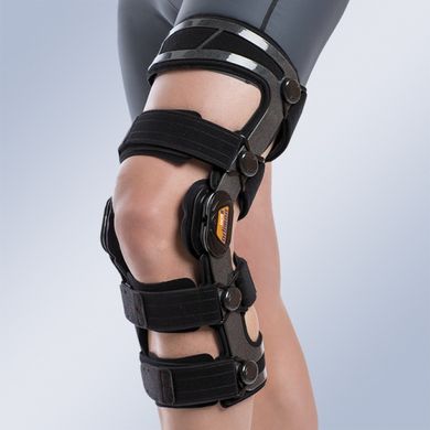 Армированный функциональный коленный ортез с ограничителем арт.OCR200 Orliman